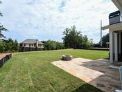 HUGE Outdoor Space with Firepit and Fireplace for Entertaining at Provence by Waterford Homes at Regency Point